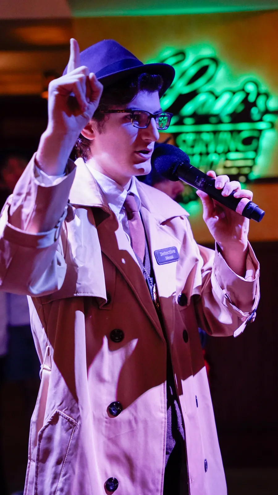 A Murder Mystery Company actor working the room at a Jacksonville show